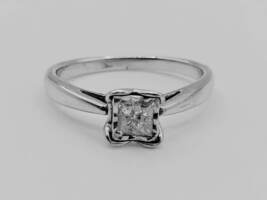 Lady's 10 Karat White Gold Princess Cut Solitaire in Heart Shaped Claws
