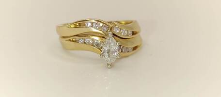 Lady's 14 Karat Yellow Gold Marquise Diamond Shape Center Stone Wedding Set