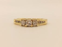 Lady's Engagement Ring with Princess Cut Diamonds 