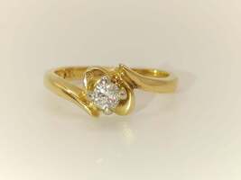 Lady's 14 Karat Yellow Gold Solitaire Diamond with Thick Band