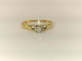 Lady's 10 Karat Yellow Gold, Size 7 with cut out hearts