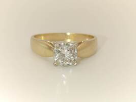 Solitaire Diamond Ring is Crafted from 14k yellow gold, 0.56CTW