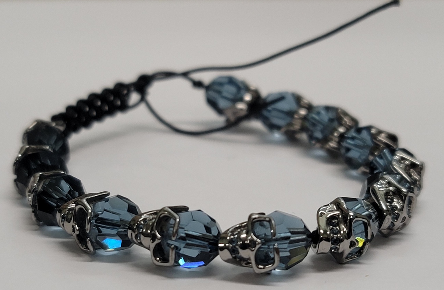 Omringd gras Alarmerend Swarovski Taddeo Rhodium Blue Crystal Skull Bracelet | Avenue Shop Swap &  Sell