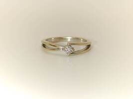 Lady's 18 Karat White Gold Solitaire Ring with Wrap Band