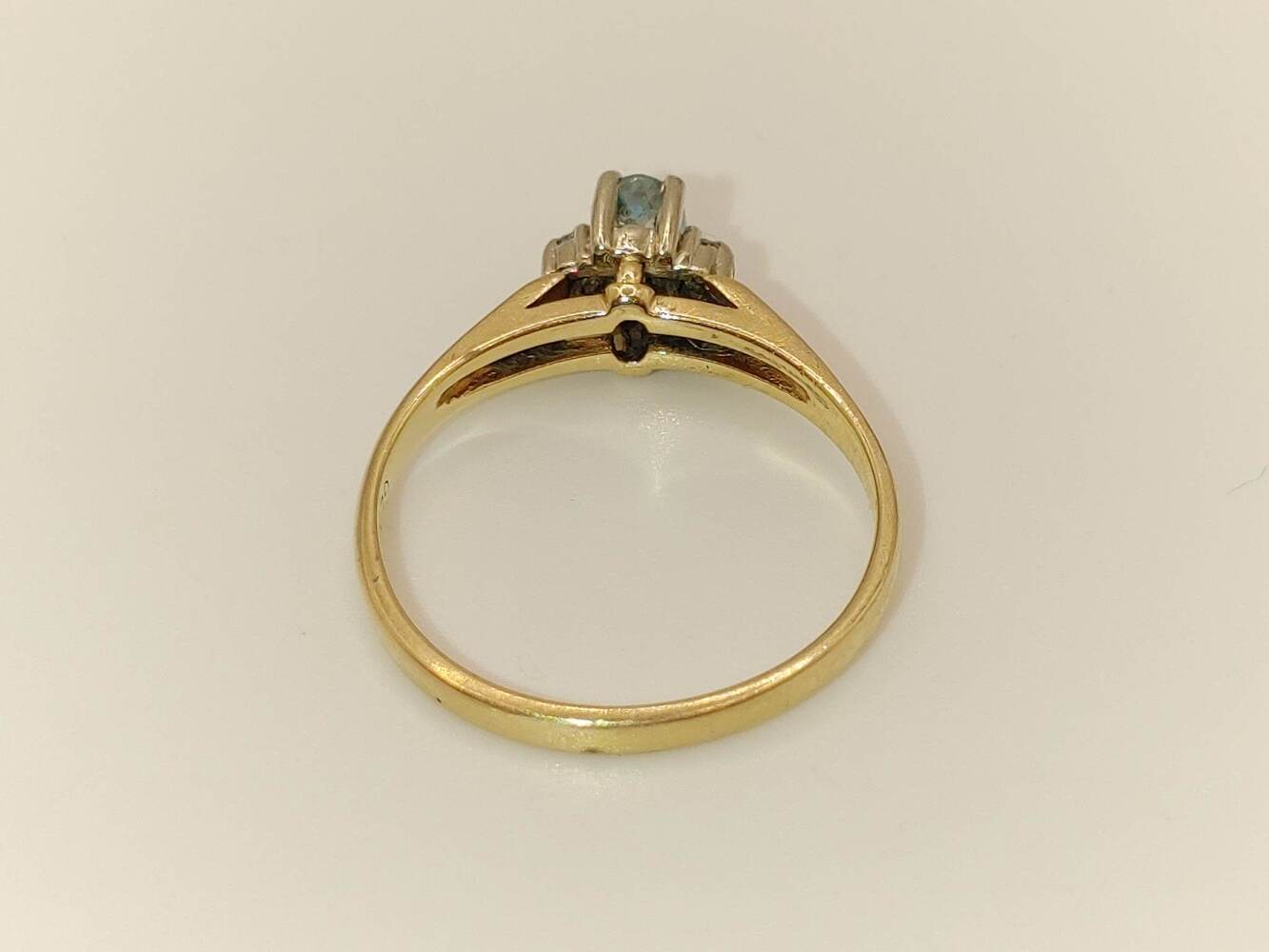 Lady's 10 Karat Yellow Gold Ring with Light Blue Oval Ring
