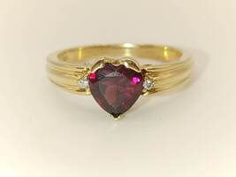 Lady's 10 Karat Yellow Gold - Deep Red Heart Stone Ring