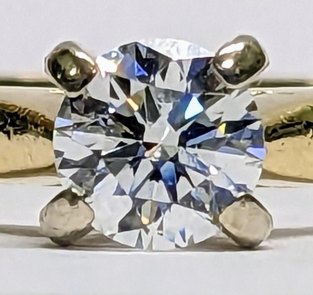 14 Karat Yellow Gold Diamond Solitaire Ring - Size: 8.75