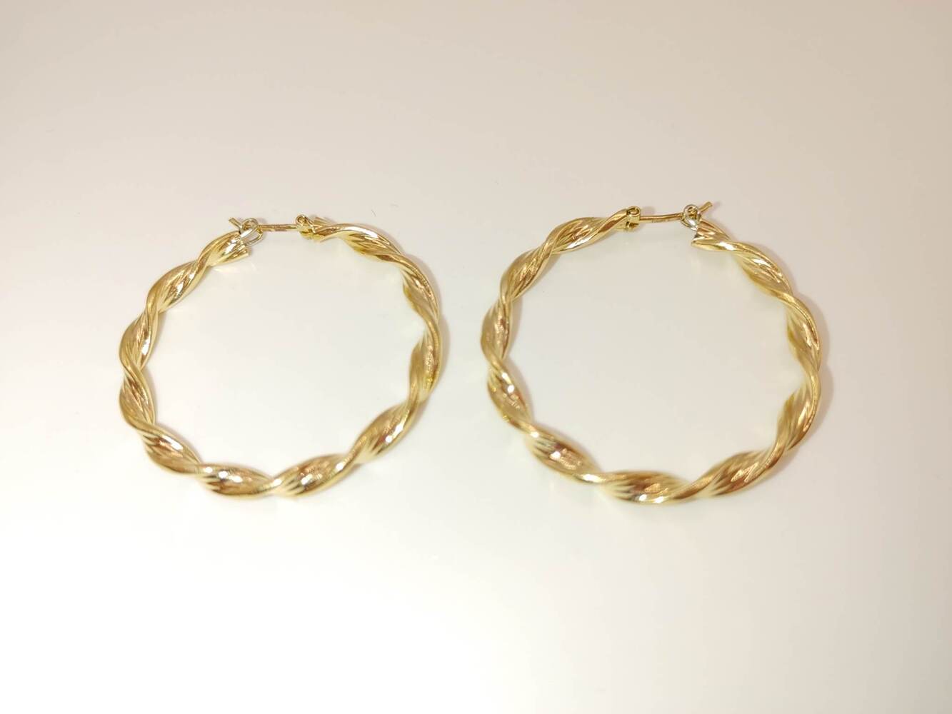 Lady's 14 Karat Yellow Gold Twisted Gold Hoops