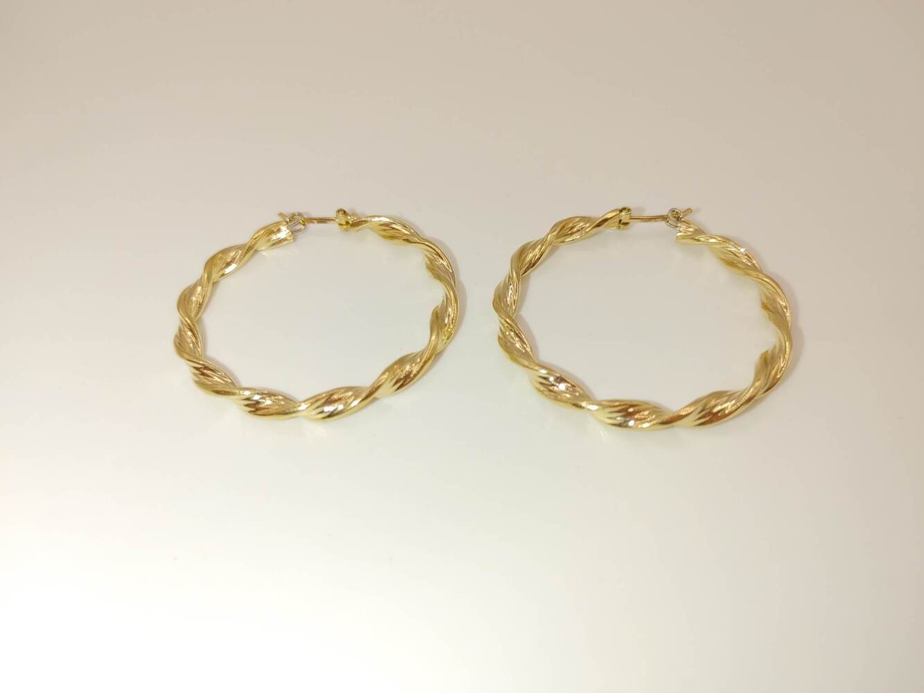 Lady's 14 Karat Yellow Gold Twisted Gold Hoops