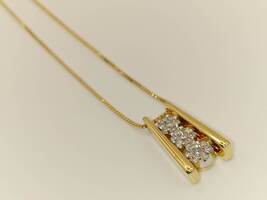 Lady's 14 Karat Yellow Gold Necklace with Diamond Charm