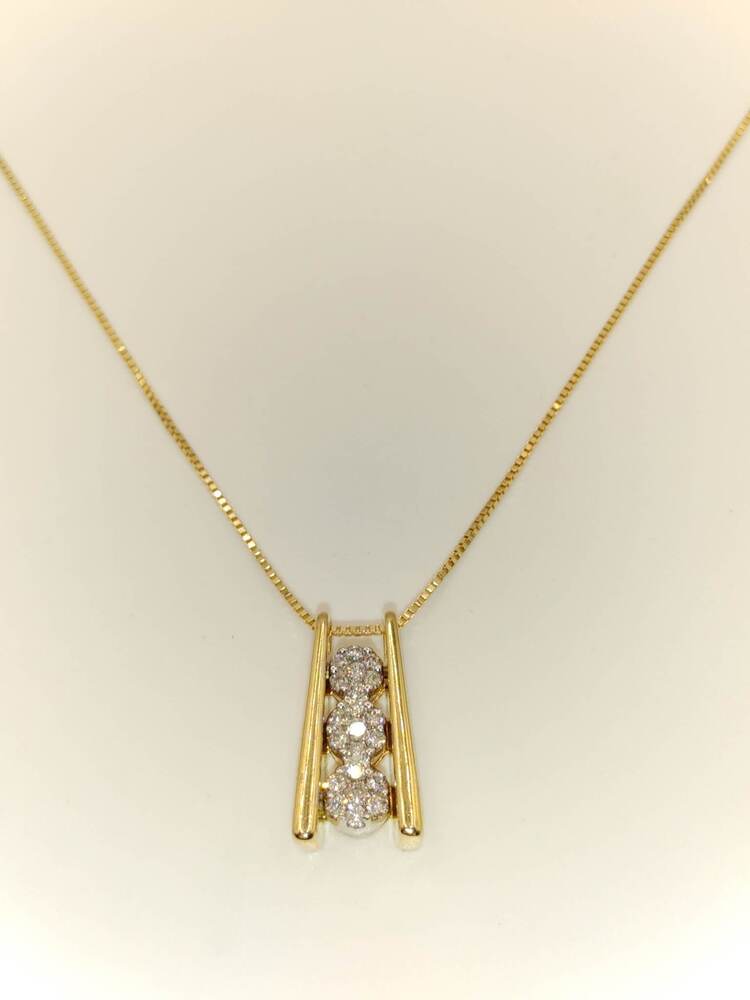 Lady's 14 Karat Yellow Gold Necklace with Diamond Charm