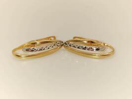 Lady's 14 Karat Tri-Gold Oval Hoops