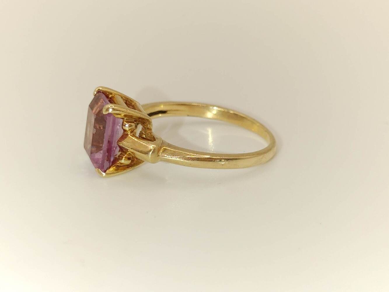 Lady's 10 Karat Yellow Gold Ring with Purple Stone