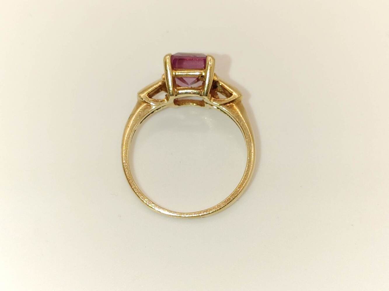 Lady's 10 Karat Yellow Gold Ring with Purple Stone