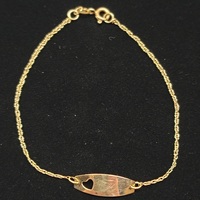 10 Karat Yellow Gold ID Bracelet with Heart Cutout - Size: 7-inch