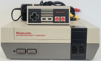 Nintendo Entertainement System (NES) with Controller and Power Cords 