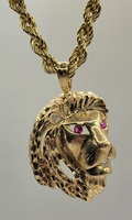 10k Yellow Gold Red Gemstone & Diamond Lionhead Pendant Approximate t.c.w. 0.26