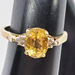 Lustrous Ladies 10k Yellow Gold Ring with Stunning Yellow Oval Gemstone