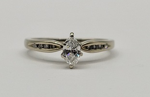 14k White Gold Marquise Diamond Solitaire Ring Size 4.25 Approximate t.c.w. 0.20
