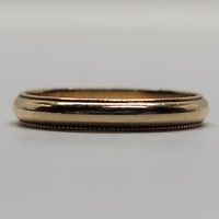 14 Karat Yellow Gold Band Ring - Size: 5.5