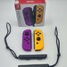 Nintendo Switch Orange/Purple Joy-Cons in Box with Wrist Straps