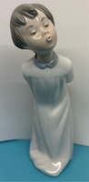 Lladro #4869 "Boy Blowing Kiss" 