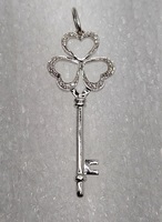 14 Karat White Gold Key With 30 Round Clear Stones Pendant