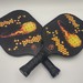 Pair of MA Pickleball Paddles in Slipcovers