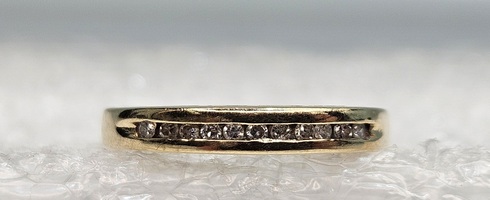 10 Karat Yellow Gold Diamond Chip Channel Set Band - Size 6