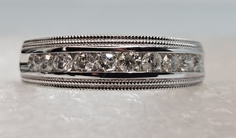 10 Karat White Gold Diamond Channel Set Band - Size 12