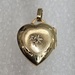 10 Karat Yellow Gold & 1 Diamond Heart Locket Pendant
