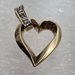 10 Karat Yellow Gold Heart Pendant With 3 Diamonds Pendant