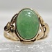 14 Karat Yellow Gold Oval Green Gemstone Ring - Size 8.5