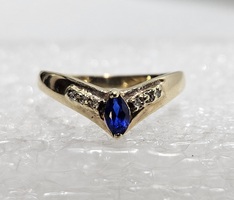 10 Karat Yellow Gold Blue Marquise Cut Gemstone & 6 Clear Stones - Size 5.5