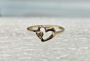 10 Karat Yellow Gold Heart Ring With A Clear Stone - Size 3 