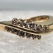 14 Karat Yellow Gold Round Clear Stone Band - Size 4.75