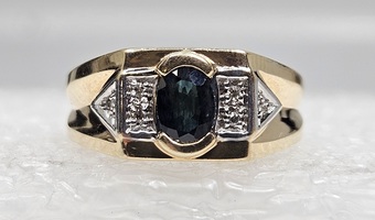 10 Karat Yellow Gold Oval Blue Main Stone & 6 Diamonds - Size 10