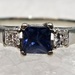 18 Karat White Gold 1 Blue & 2 Clear Cut Emerald Stones Ring - Size 5.75