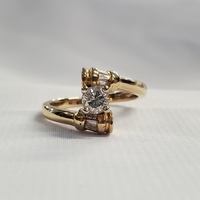 14 Karat Yellow Gold Size 6 Diamond Solitaire Bypass Ring