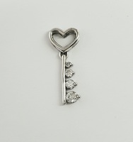 10 Karat White Gold and Diamond Key Pendant