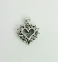 10 Karat White Gold and Diamond Heart Pendant